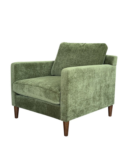 Green armchair on a white background