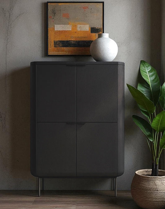 Dark gray cabinet with a vase and plant in a room setting