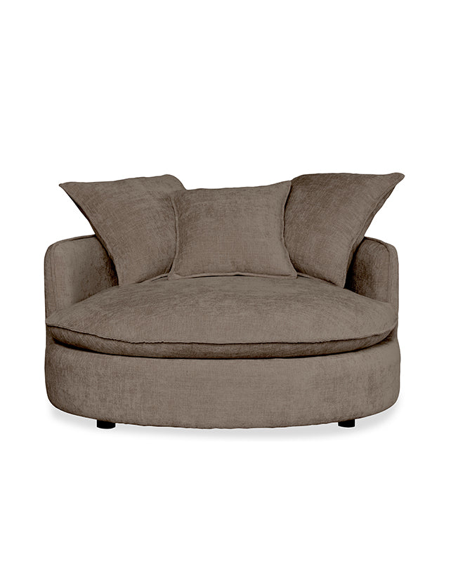 Brown upholstered chair with three cushions on a white background