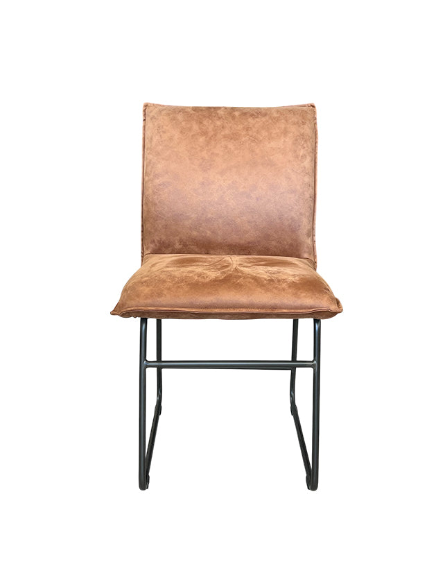 Brown leather chair with black metal legs on a white background