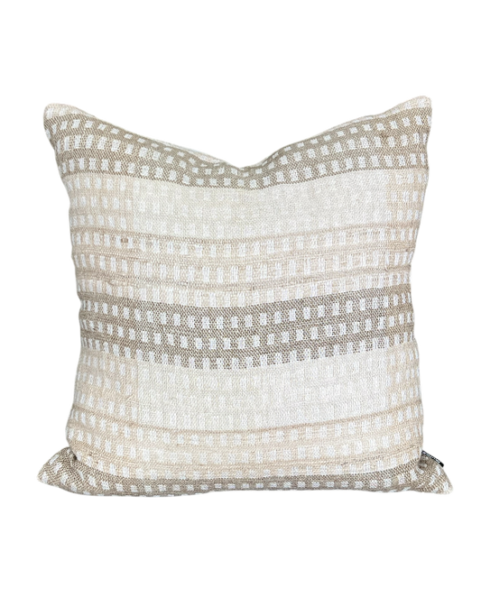 Decorative pillow with a striped pattern on a white background